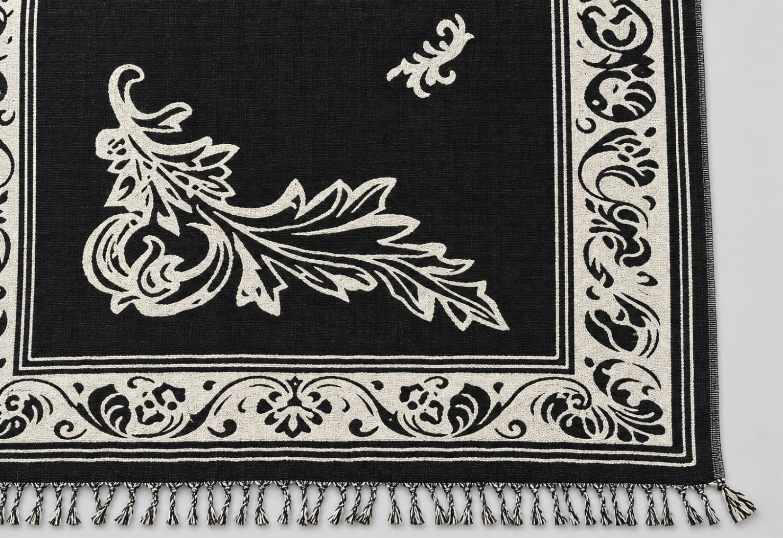Black and ivory jacquard scarf detail